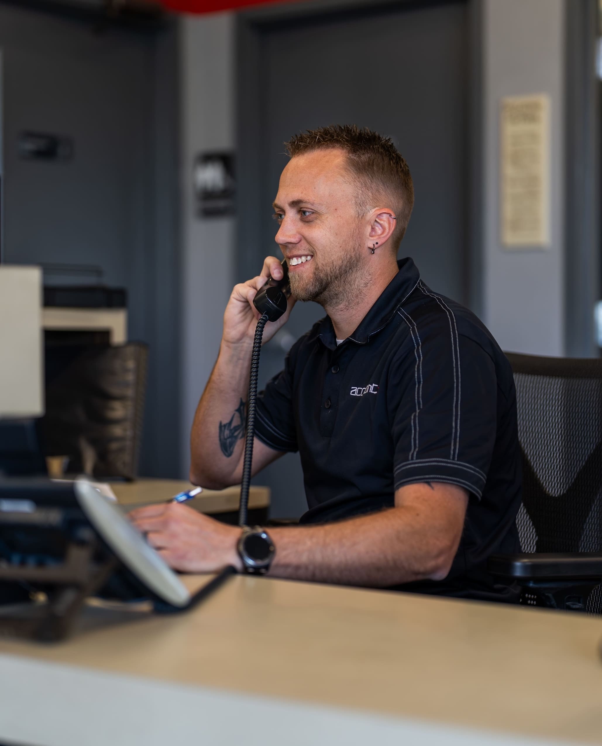 Accutint Bellevue employee talking on the phone