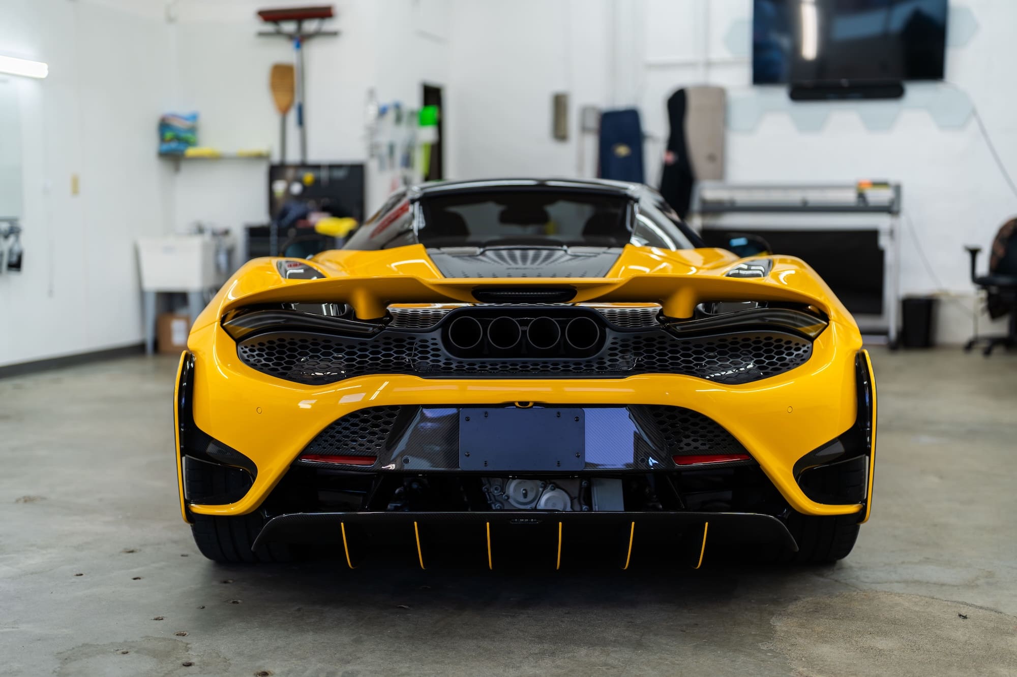 Back end of yellow and black car