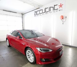 Red Tesla Model at Accutint Bellevue